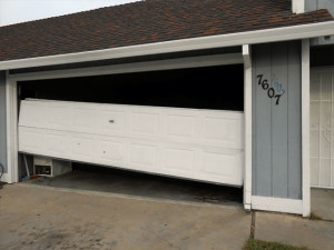 Garage-Door-Repair-Before-A1-Outside-Broken